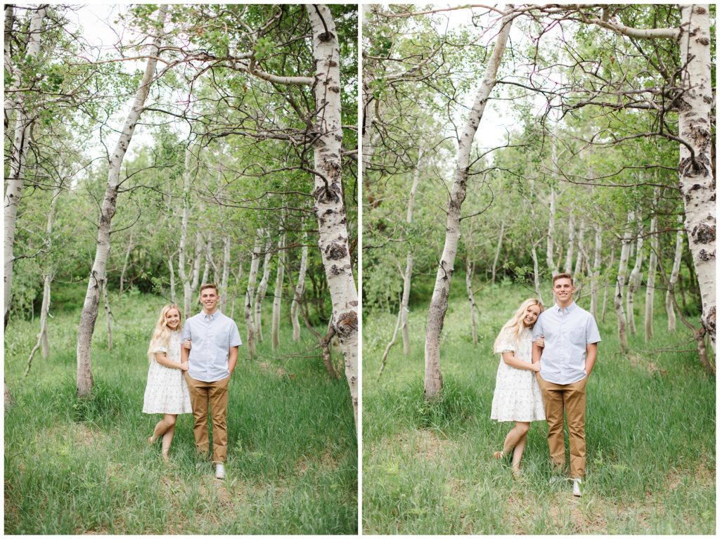 Couple Photoshoot. Couple is looking at the camera and smiling in a grove of aspen trees. Photo by Utah Photographer Mary Horne Nelson.