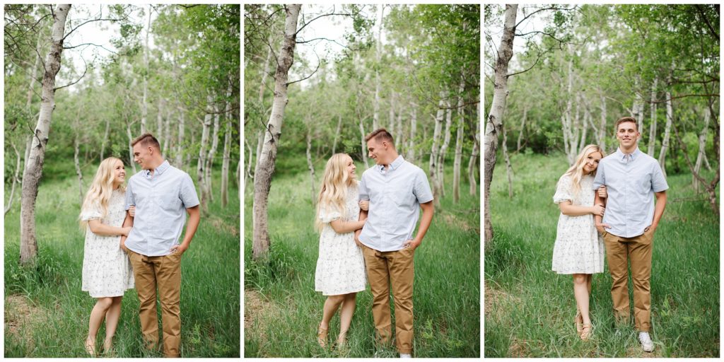 Utah Couples Photo shoot. Couple is standing in a grove of aspens in Provo Canyon, looking at each other, and looking at the camera. Photo by Utah Photographer Mary Horne Nelson.