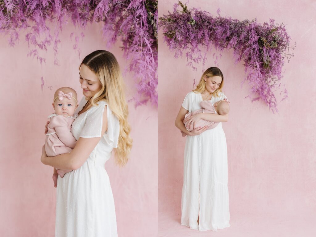 Mother and daughter cuddle under a floral installation. Utah Motherhood Photographer Mary Horne Nelson